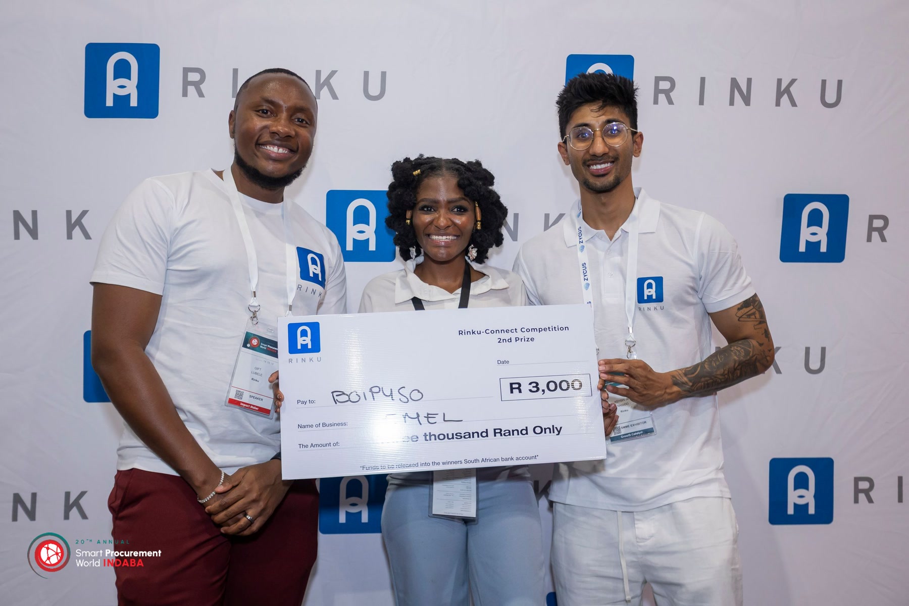 Gift Lubele with Boipuso Emel, second-prize winner of the Rinku-Connect Competition at Smart Procurement World Indaba. Photograph.